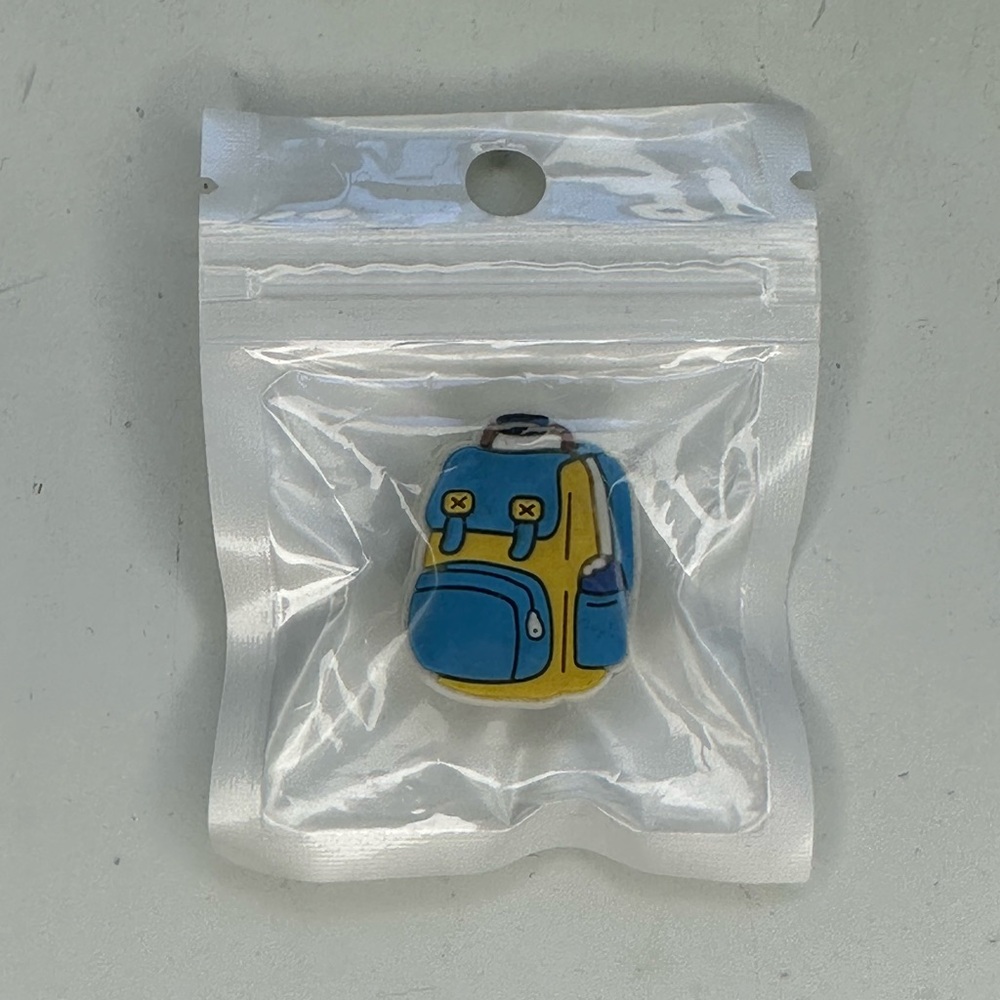 Blue and Yellow Backpack Croc Jibbitz